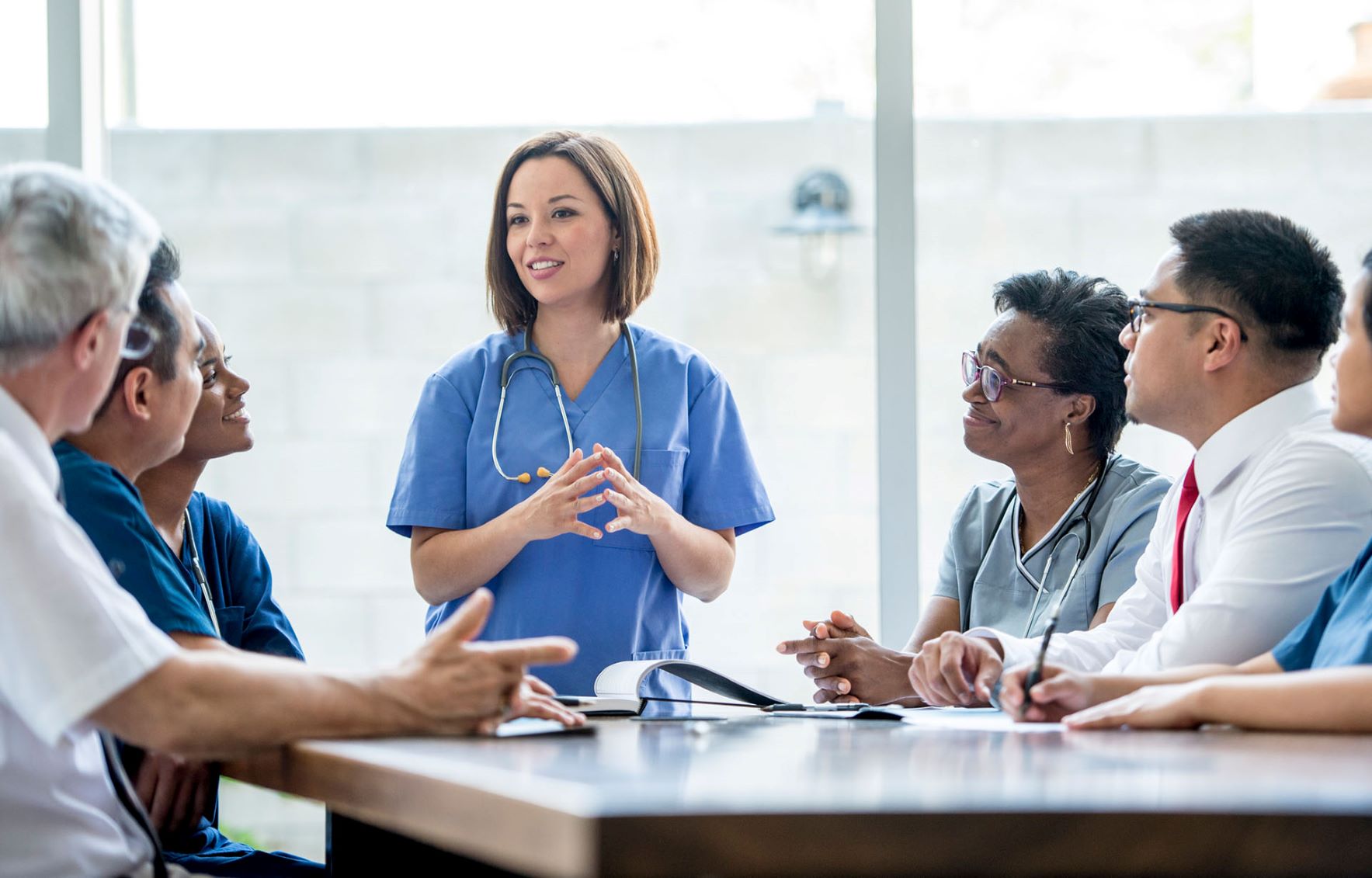 Doctor talking to group