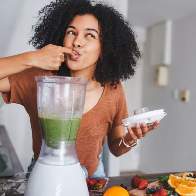 Woman making smoothie
