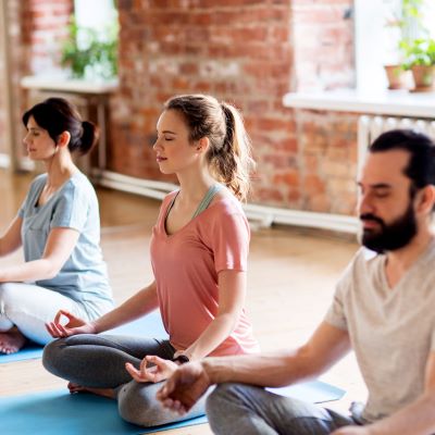 People meditating