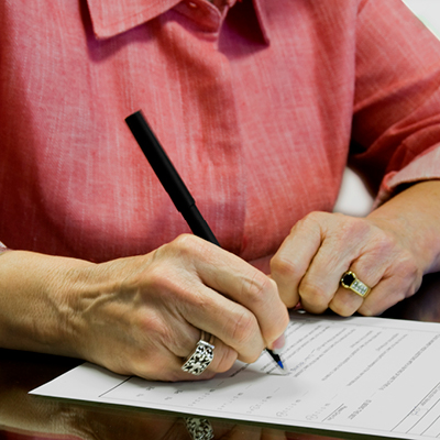 Person filling out form