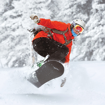 Person snowboarding down a hill