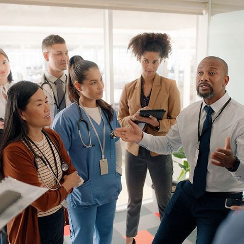 Man Talking With Doctors